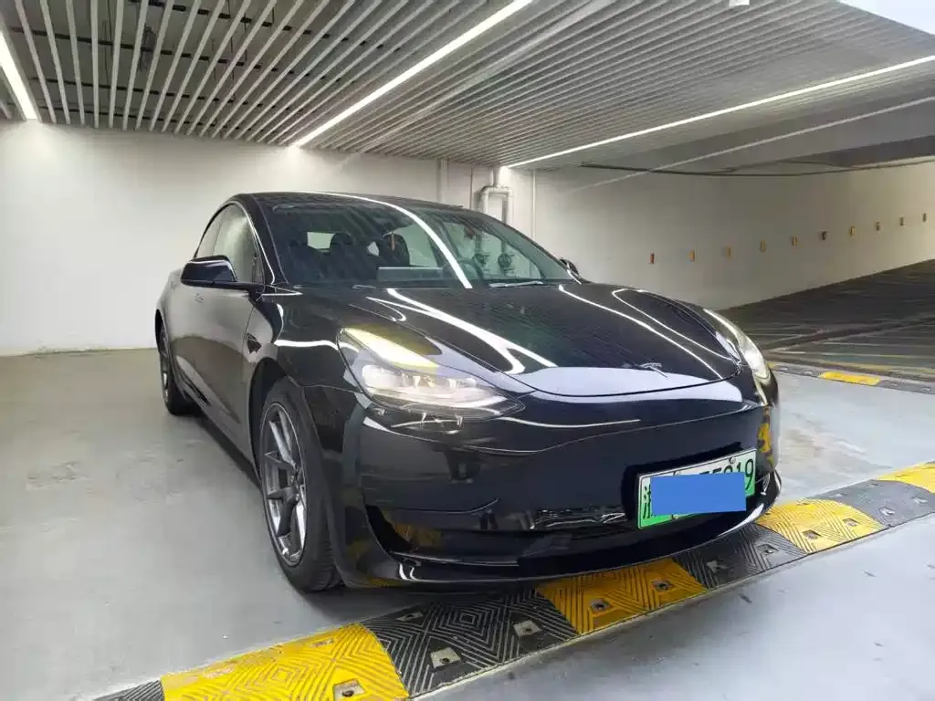 Tesla Model 3 — фото 9