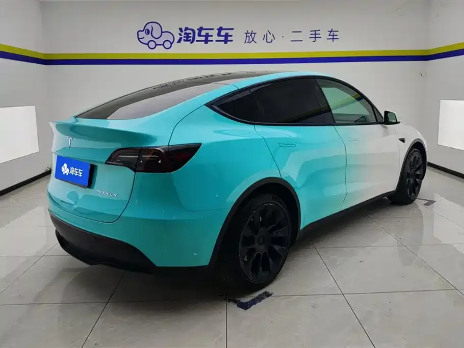 Tesla Model Y — фото 9