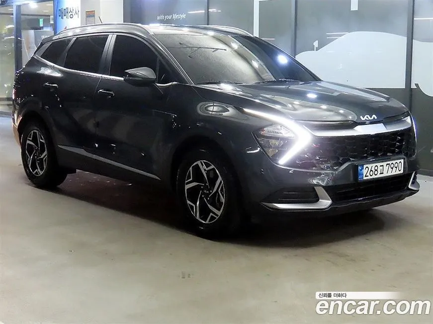 Kia Sportage — фото 1