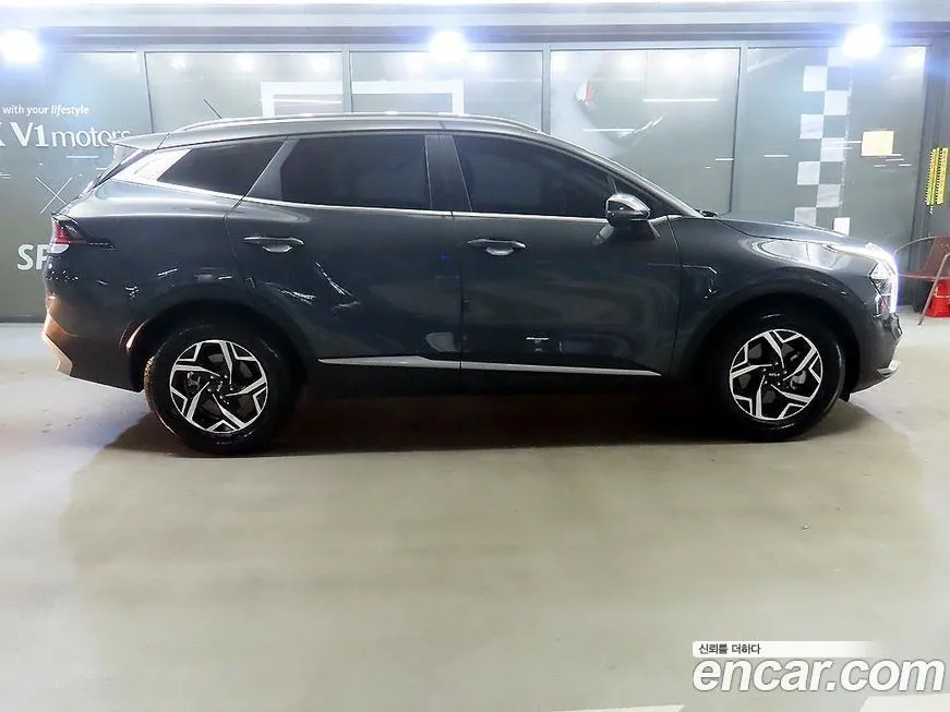 Kia Sportage — фото 7