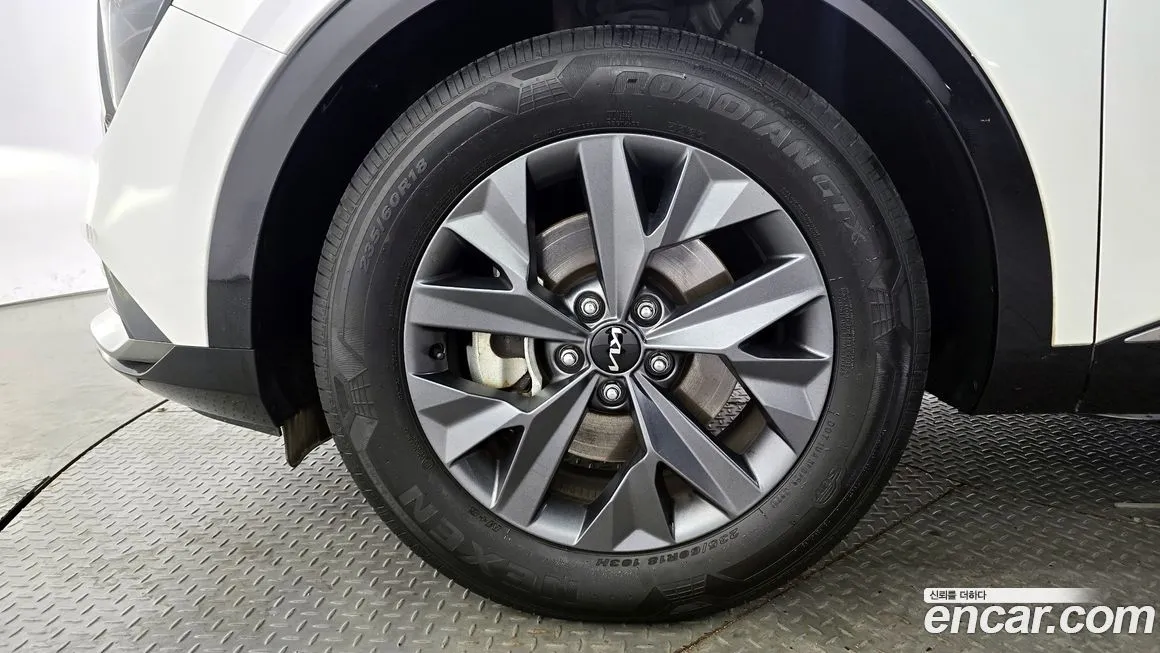 Kia Sportage — фото 10