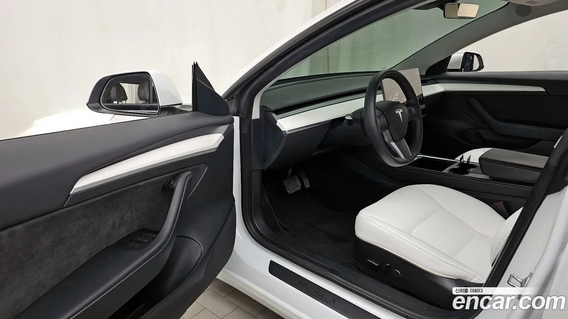 Tesla Model 3 — фото 2