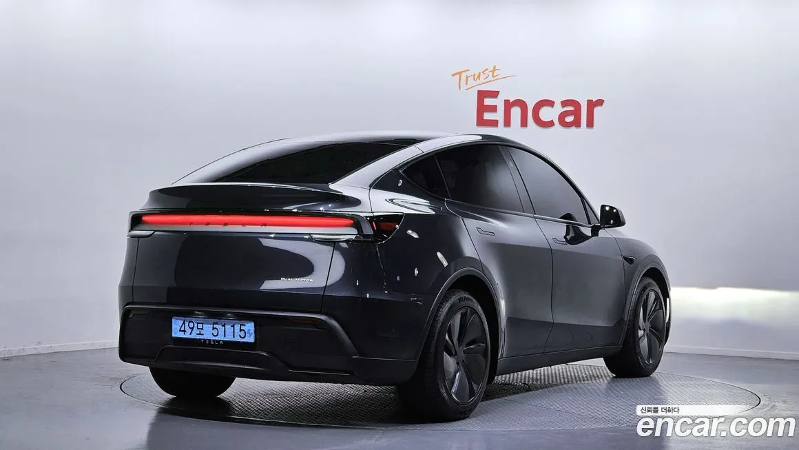 Tesla Model Y — фото 9
