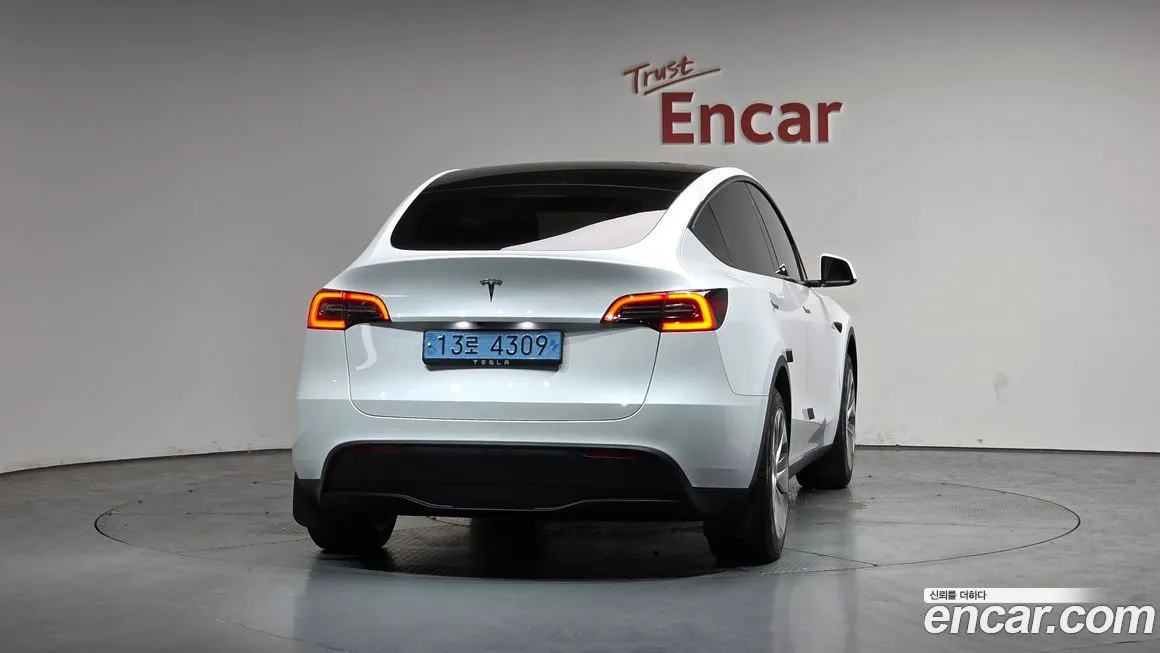 Tesla Model Y — фото 5
