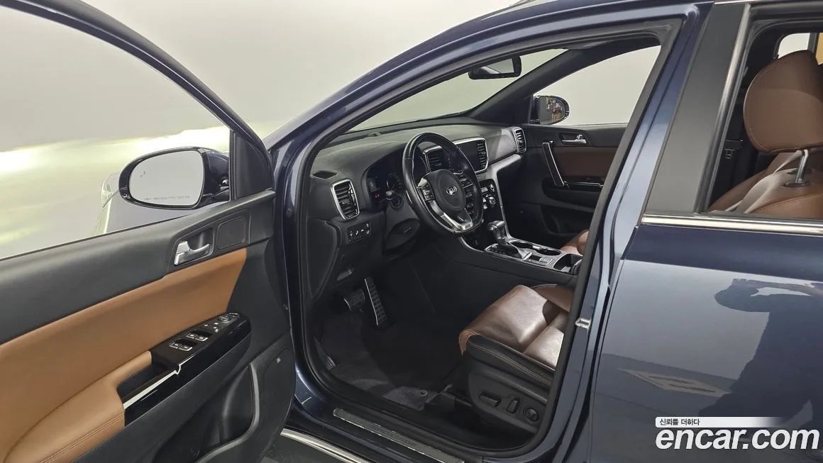 Kia Sportage — фото 8