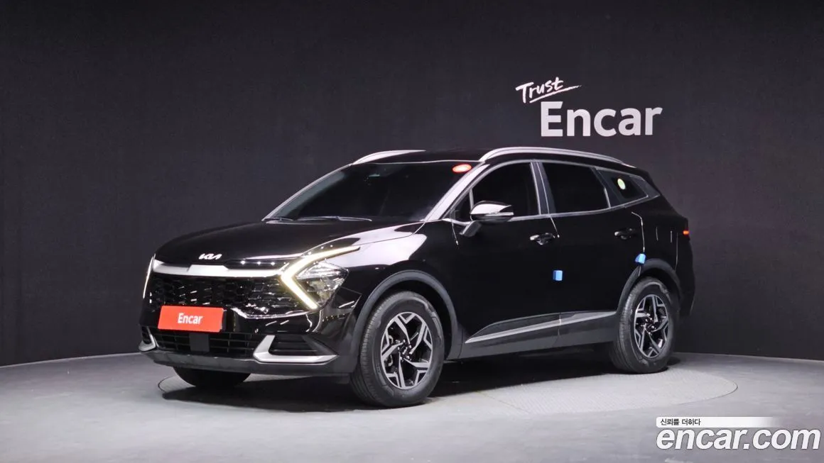 Kia Sportage — фото 1