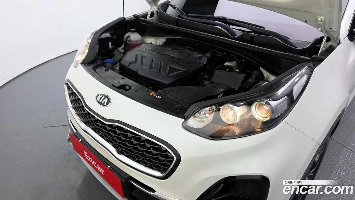 Kia Sportage — фото 10