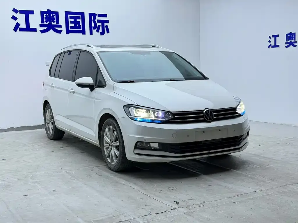Volkswagen Touran — фото 4