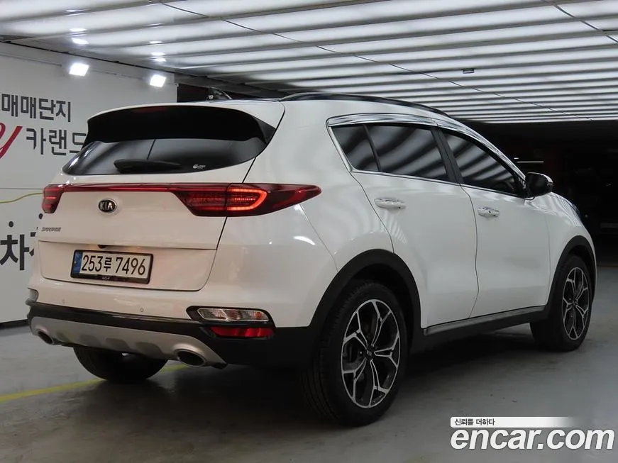 Kia Sportage — фото 10