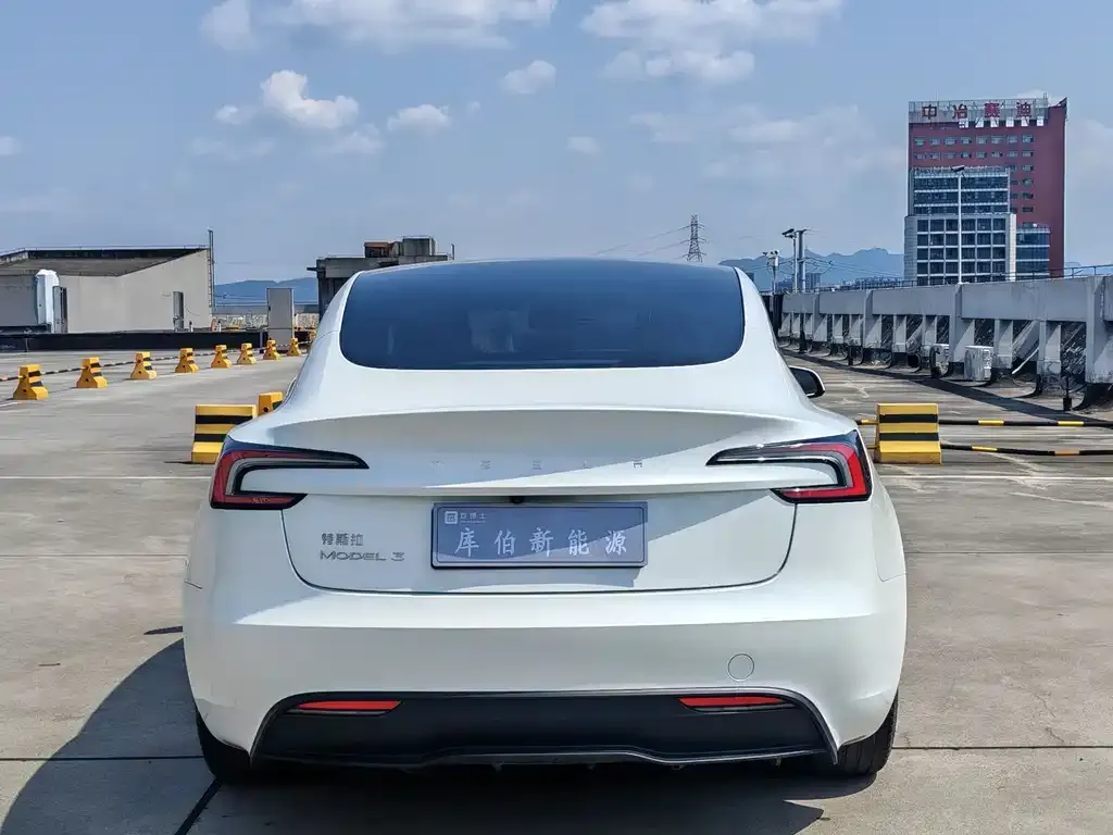 Tesla Model 3 — фото 7