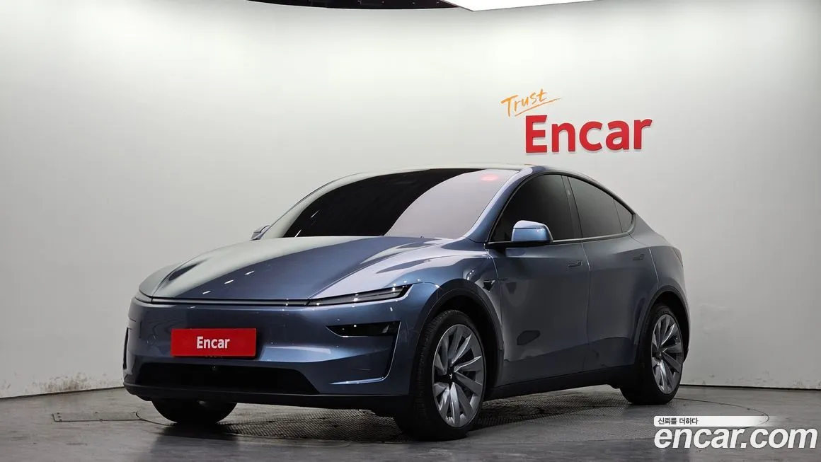 Tesla Model Y — фото 1