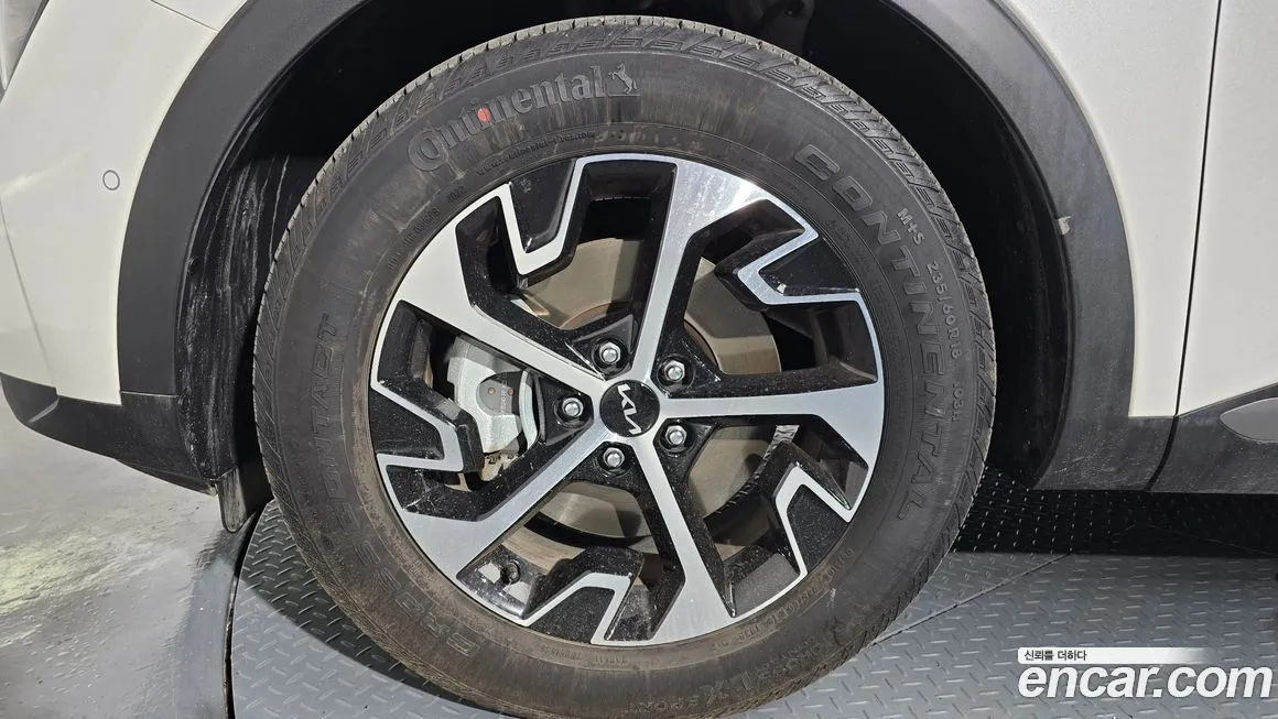 Kia Sportage — фото 10
