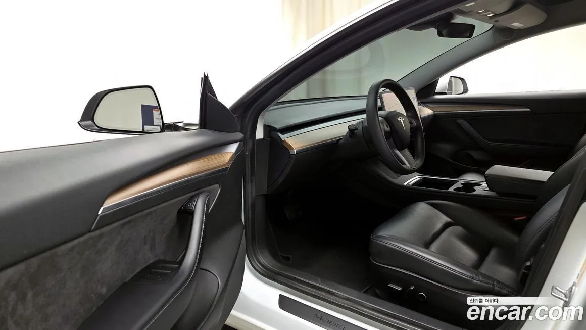 Tesla Model 3 — фото 6