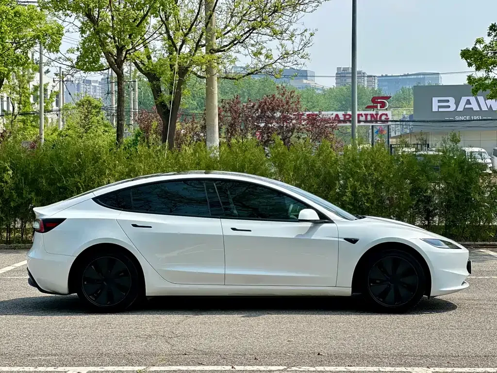 Tesla Model 3 — фото 7