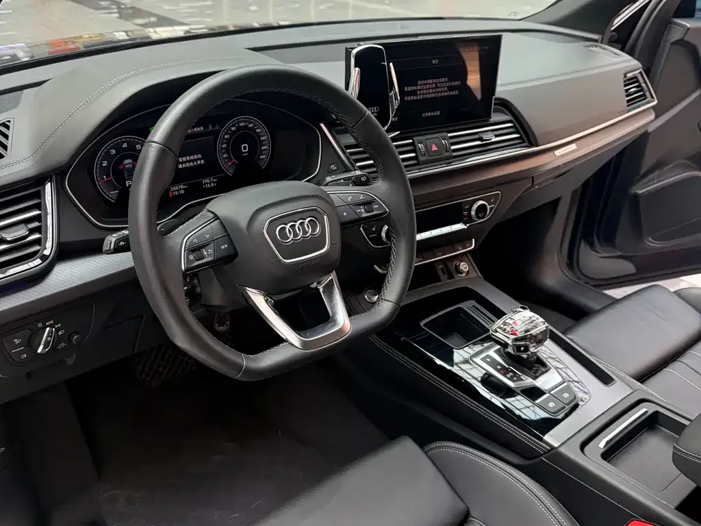 Audi Q5L — фото 3