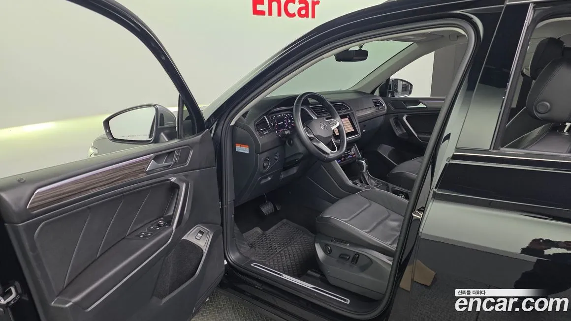 Volkswagen Tiguan — фото 10