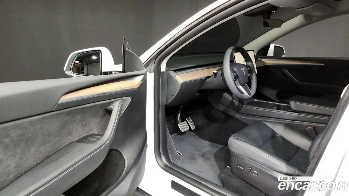 Tesla Model Y — фото 7