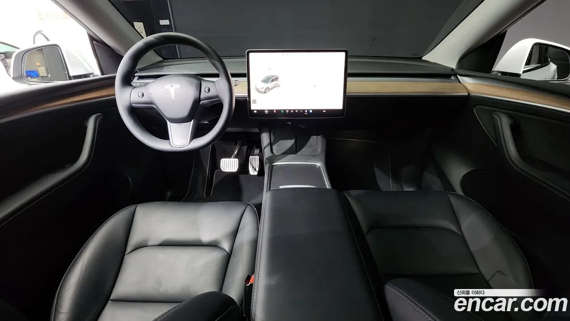 Tesla Model Y — фото 10
