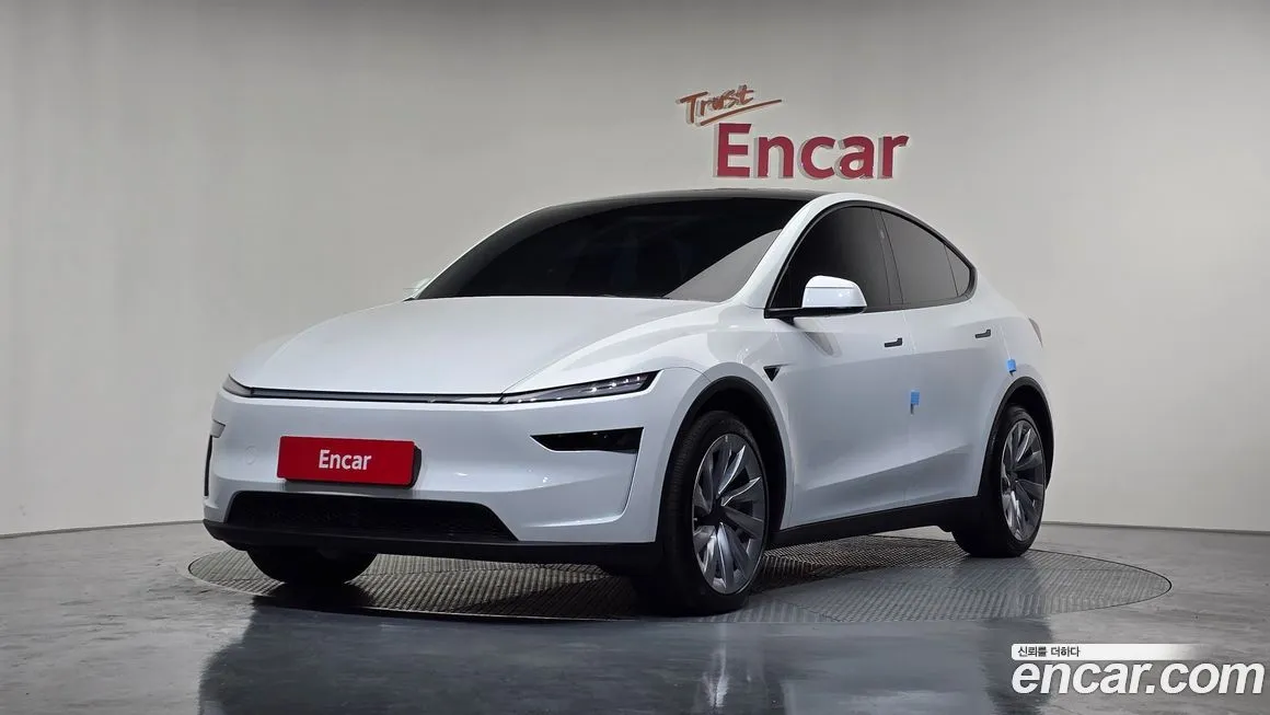 Tesla Model Y — фото 1