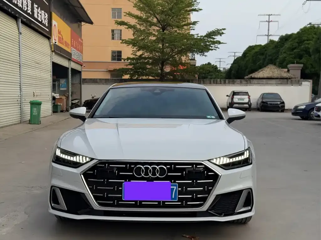 Audi A7L — фото 7