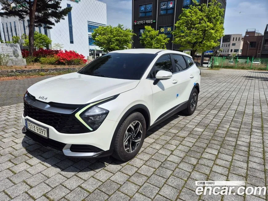 Kia Sportage — фото 10