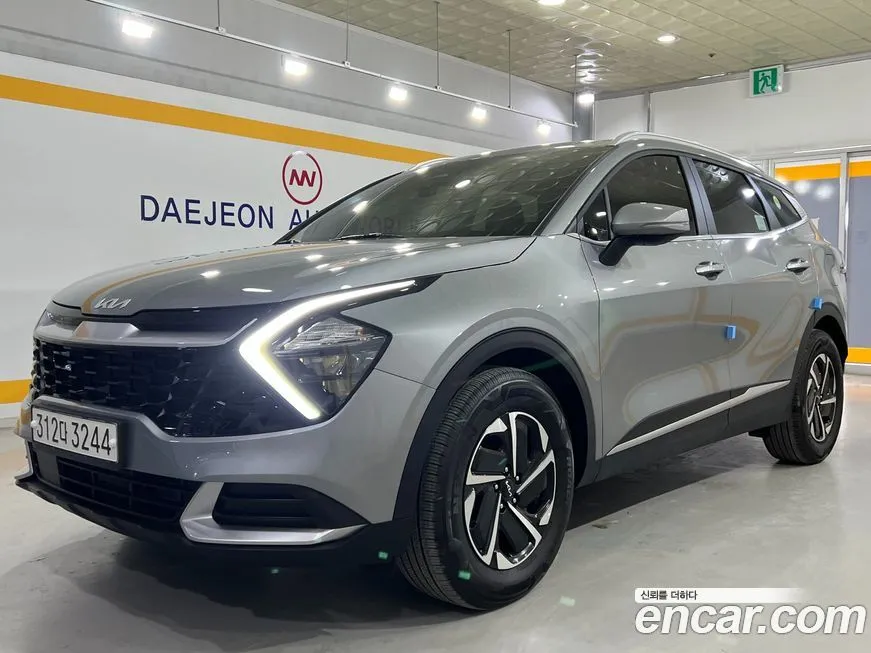 Kia Sportage — фото 1