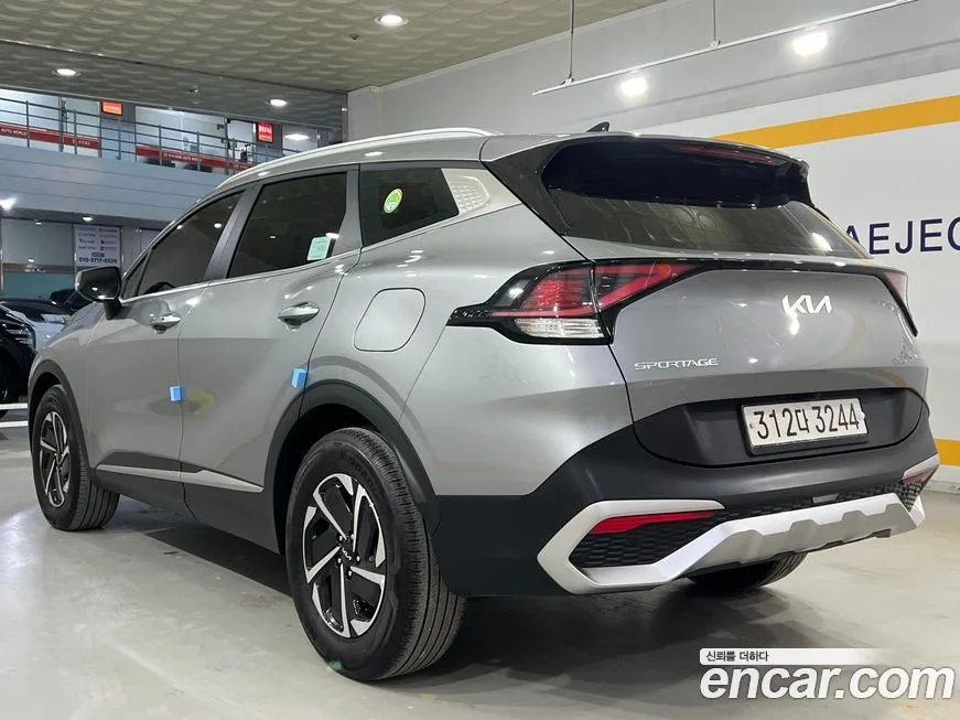 Kia Sportage — фото 7