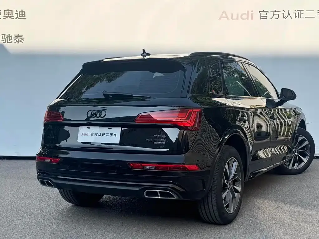 Audi Q5L — фото 10