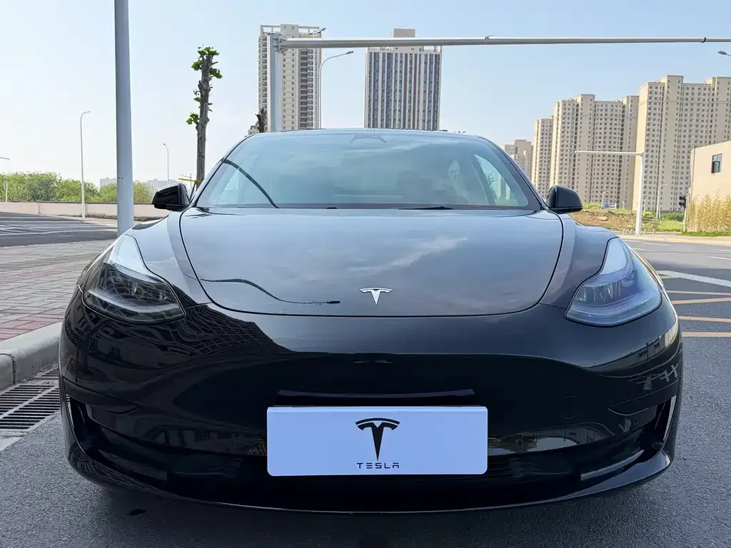Tesla Model 3 — фото 7