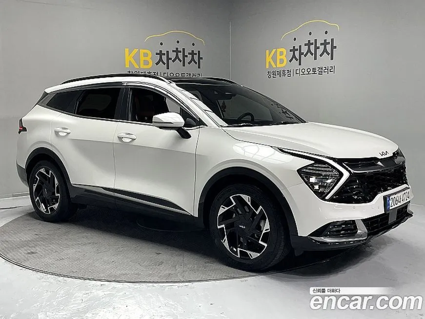 Kia Sportage — фото 1