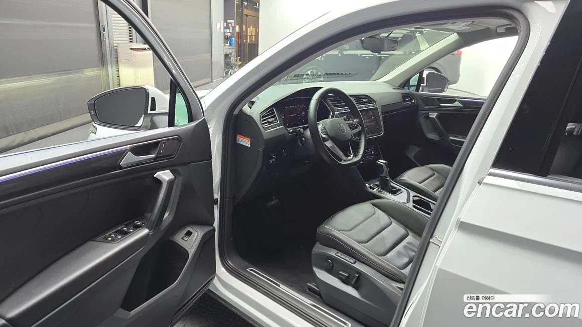 Volkswagen Tiguan — фото 10
