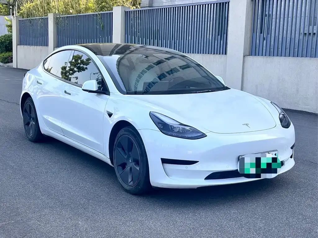 Tesla Model 3 — фото 7