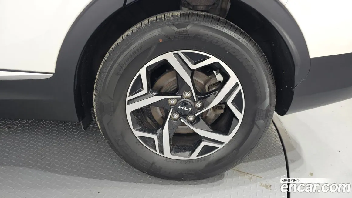 Kia Sportage — фото 10