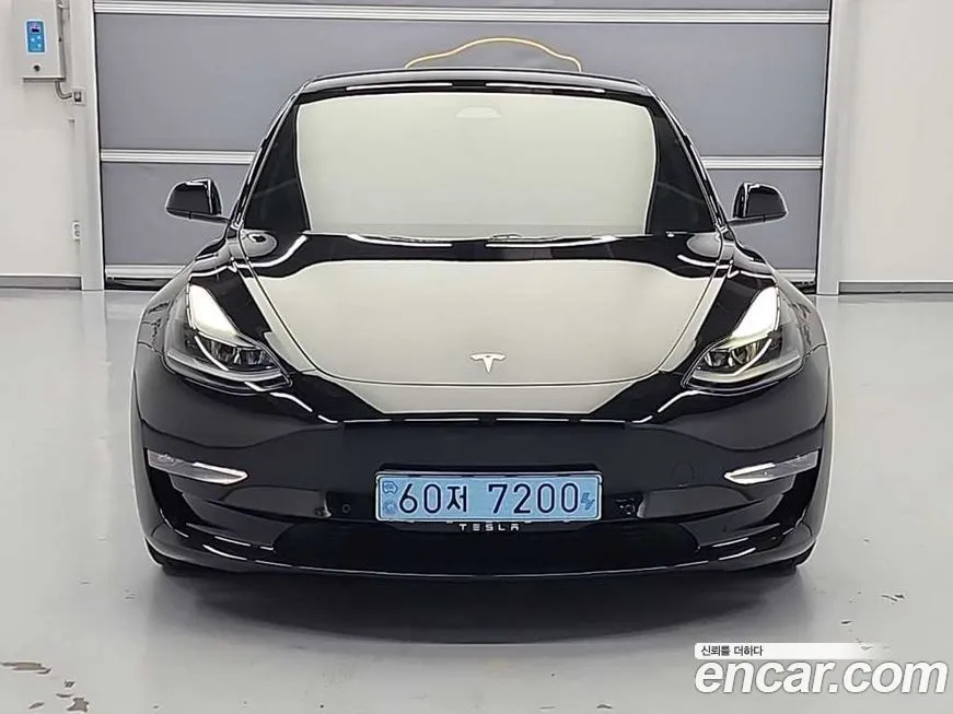 Tesla Model 3 — фото 5