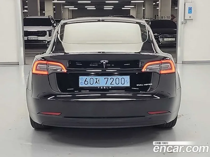 Tesla Model 3 — фото 9