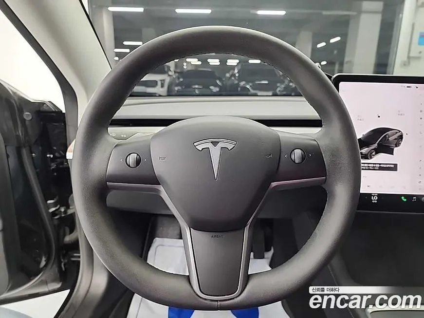 Tesla Model 3 — фото 10