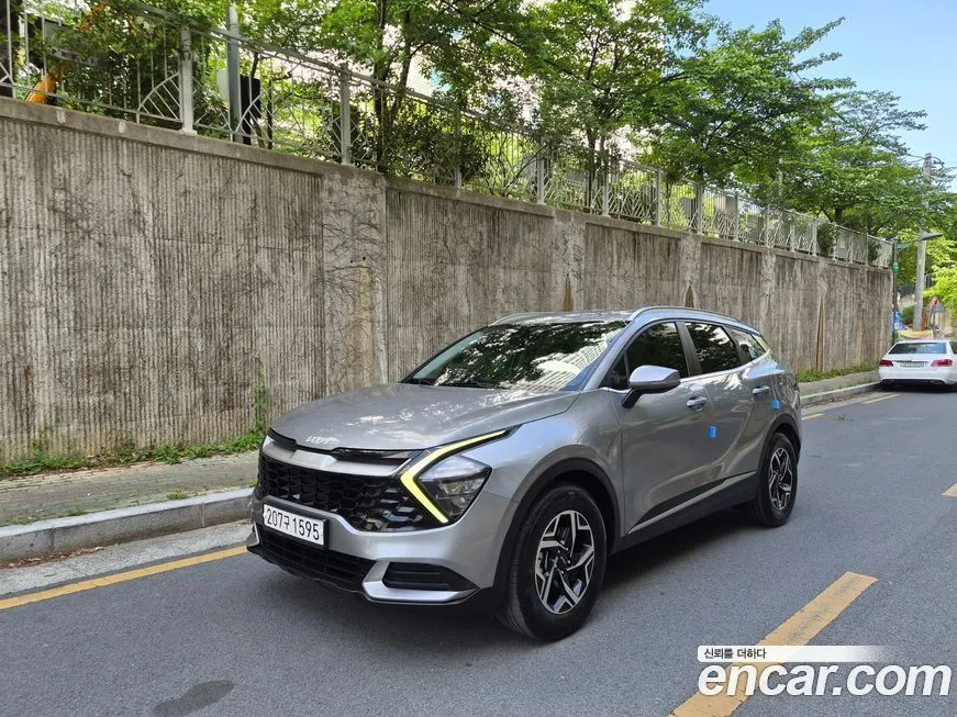 Kia Sportage — фото 1