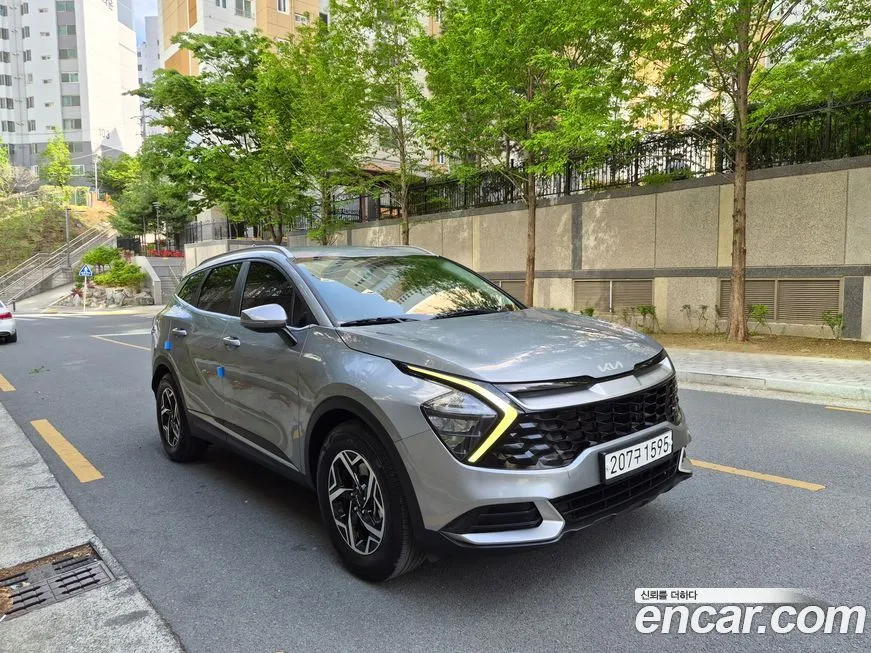 Kia Sportage — фото 10