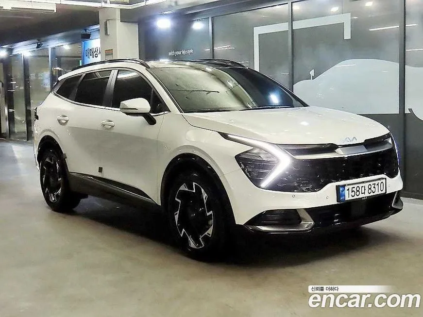 Kia Sportage — фото 1