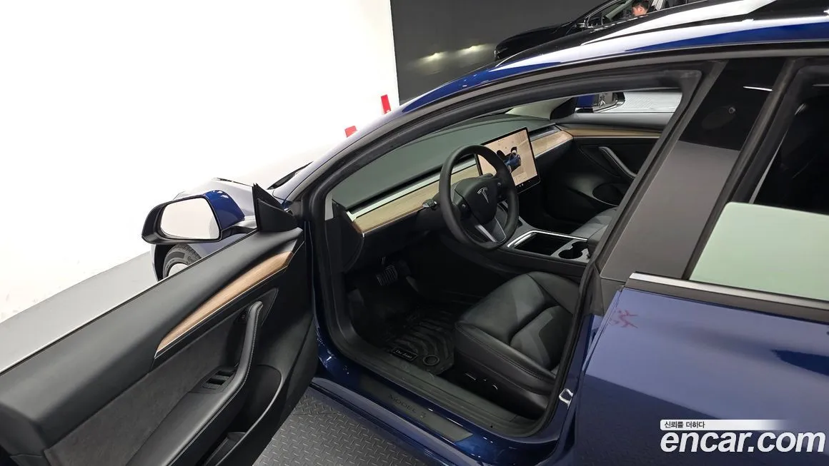 Tesla Model 3 — фото 10