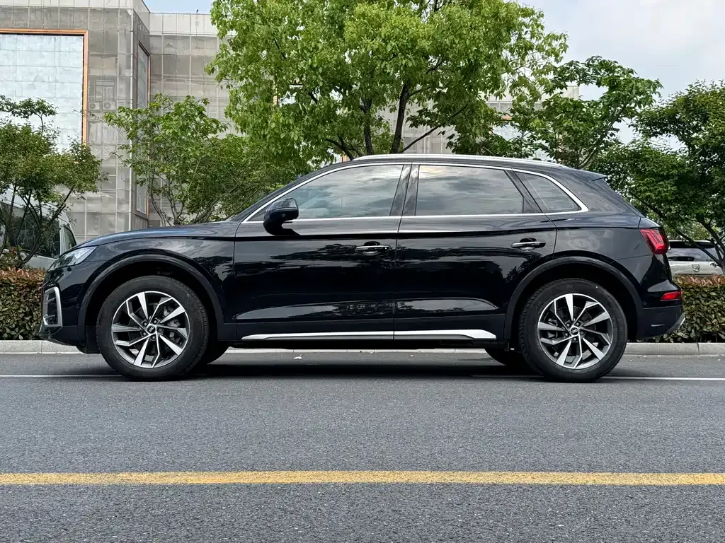 Audi Q5L — фото 5