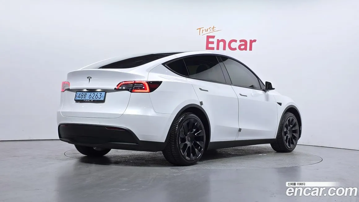 Tesla Model Y — фото 2