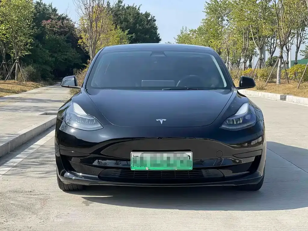 Tesla Model 3 — фото 7