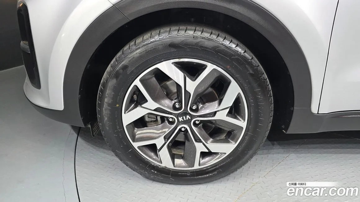 Kia Sportage — фото 10