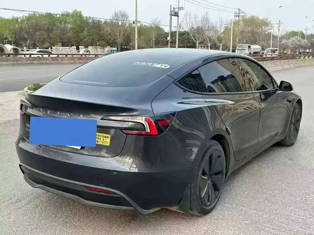 Tesla Model 3 — фото 7
