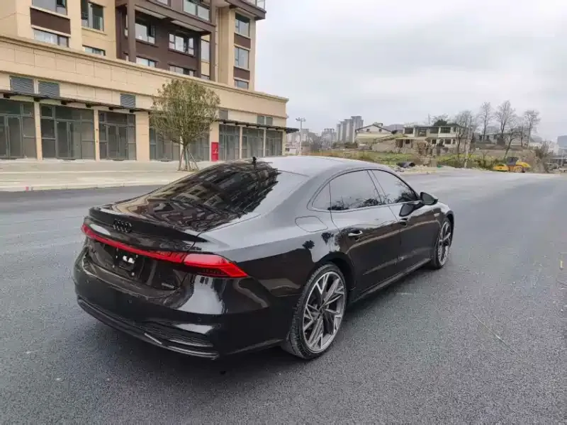 Audi A7L — фото 7