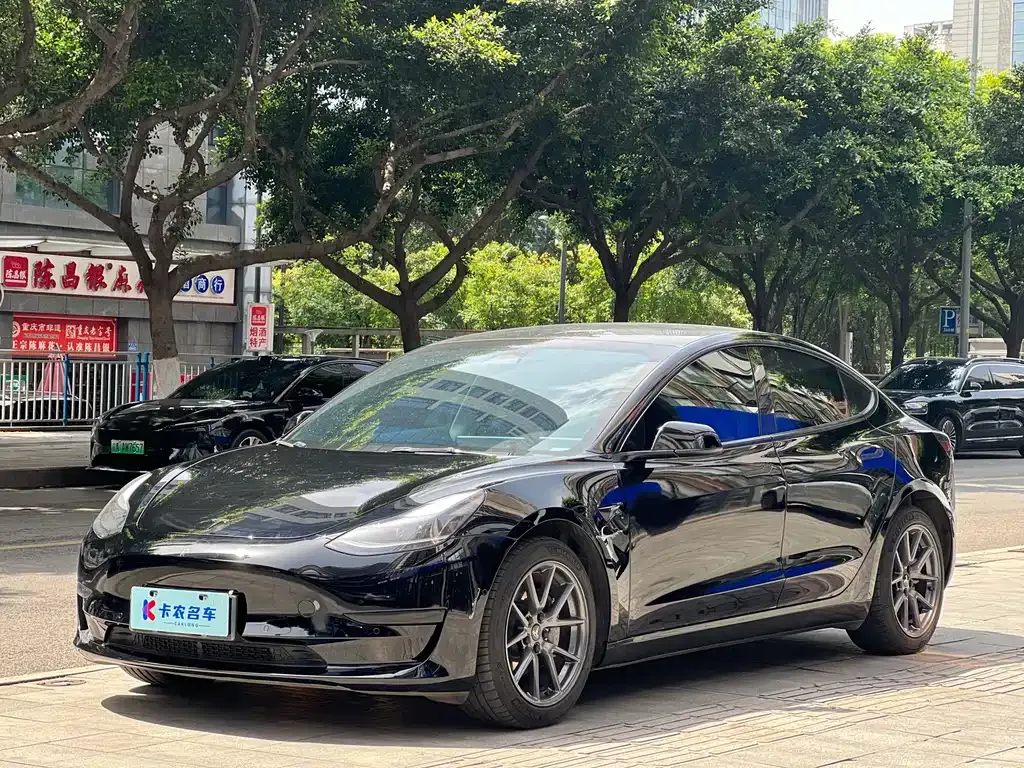 Tesla Model 3 — фото 10