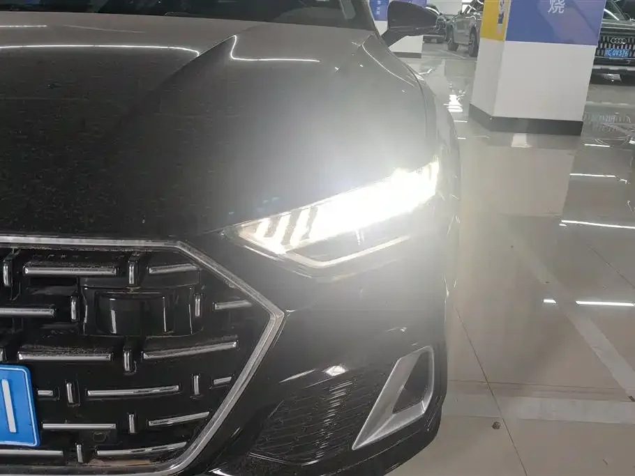 Audi A7L — фото 8