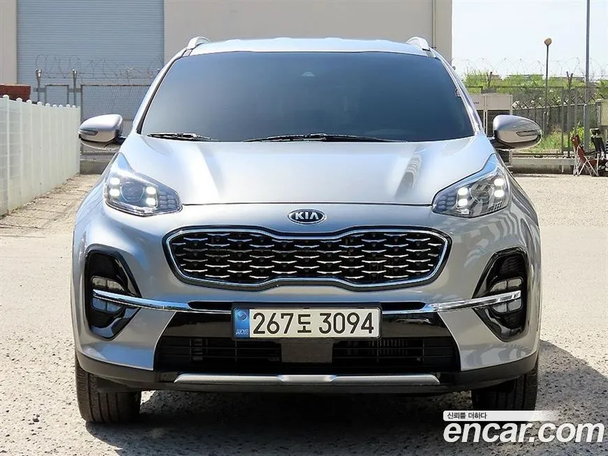 Kia Sportage — фото 1