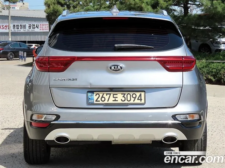 Kia Sportage — фото 7